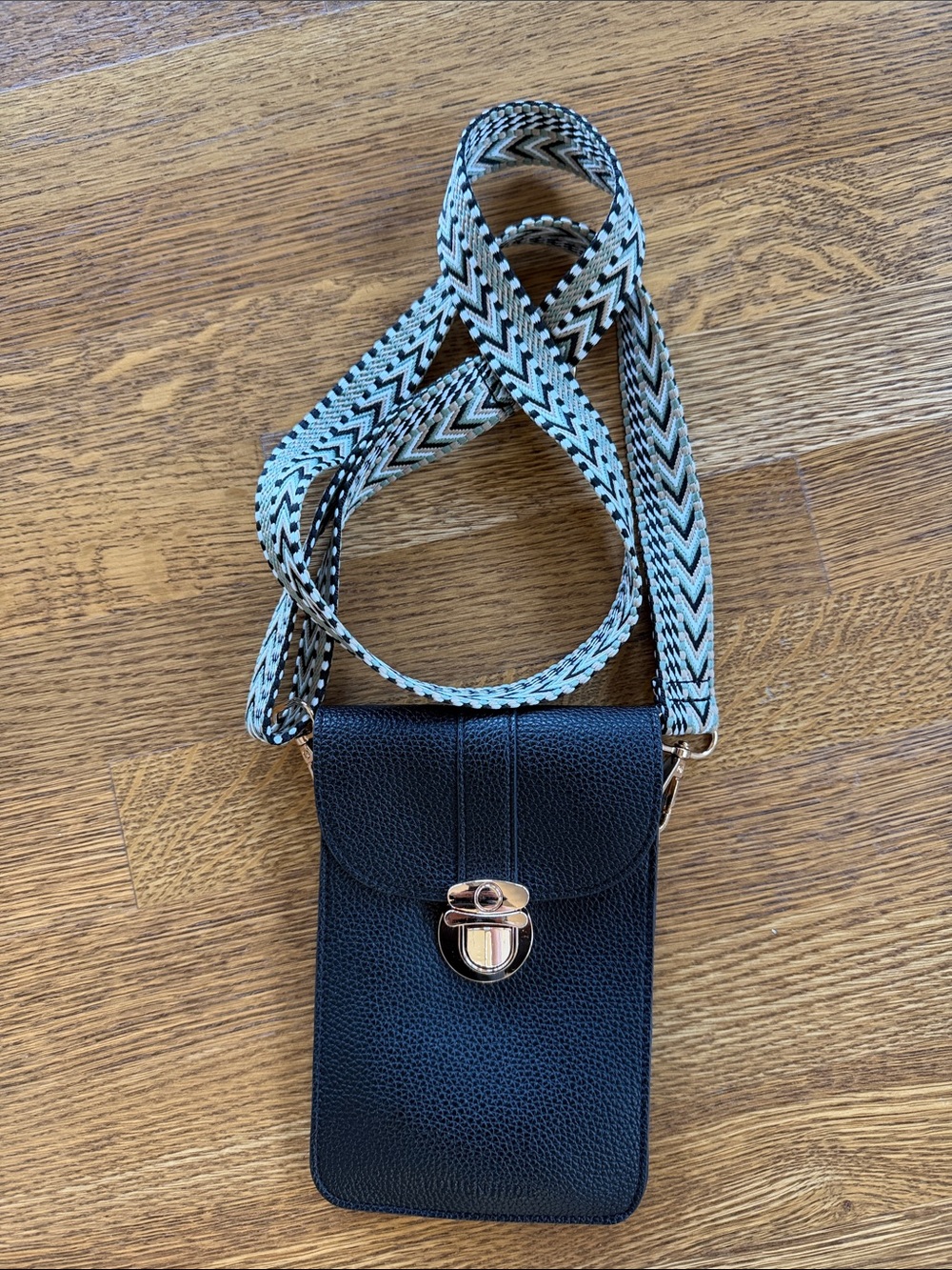 Louenhide Black Pebbled soft  Crossbody Bag with Patterned Strap.